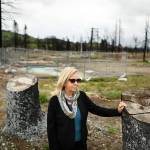 Real estate agent Sylvia West stands in the empty lots at Mark West Estates in Santa Rosa, Calif., on Wednesday. (Wally Skalij/Los Angeles Times)