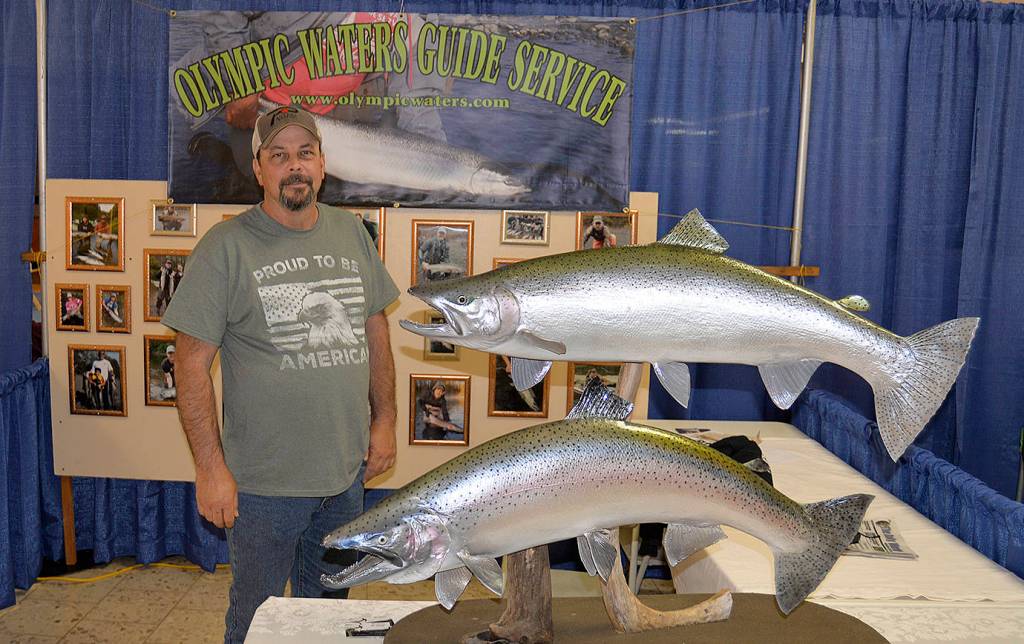 Olympic Waters Guide Service had two large steelhead mounts in its booth at the two-day expo.