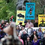 Protesters stand in solidarity with the Native Nations Rise march on Washington, D.C. against the construction of the Dakota Access Pipeline in Portland, Ore., on March 10, 2017. (Alex Milan Tracy/TNS)
