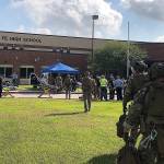 10 dead in Texas school shooting; suspect linked to posts about guns