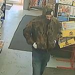 HOQUIAM POLICE DEPARTMENT                                Hoquiam Police are seeking this man, who was caught on video robbing the SmokeTown convenience store on Simpson Avenue Friday evening. Armed with a large black knife, the man was able to evade capture even after being confronted by an armed citizen as he attempted to pry open the stores cash drawer with the knife.