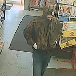 HOQUIAM POLICE DEPARTMENT                                Hoquiam Police are seeking this man, who was caught on video robbing the SmokeTown convenience store on Simpson Avenue Friday evening. Armed with a large black knife, the man was able to evade capture even after being confronted by an armed citizen as he attempted to pry open the stores cash drawer with the knife.