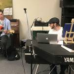 LOUIS KRAUSS | THE DAILY WORLD Chris Rondon, left, performs with JR Lakey, director of The Garage: Music & Arts Center at a jam session two weeks ago.