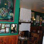Angelo Bruscas/North Coast News Liam Gibbons looks over some of the collection of personal mementoes collected for display at Galway Bay.