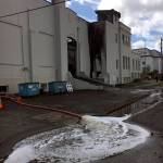 (Kat Bryant | The Daily World) Aberdeen Fire Department pumps water out of the Armory basement after the fire was put out.