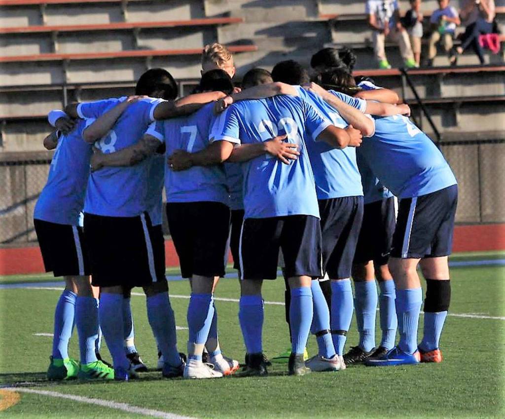 (File Photo) Grays Harbor Gulls players huddle before a game against Twin City Union on June 2.