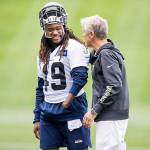 Seahawks linebacker Shaquem Griffin gets a pat on the back from head coach Pete Carroll after Seattle Seahawks minicamp at the Virginia Mason Athletic Center in Renton on Thursday. (Bettina Hansen/The Seattle Times)