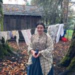 Lori Rackl | Chicago Tribune                                 Cassie Whitlock, dressed in 19th century garb, is a tour leader at Philip Foster Farm in Eagle Creek, Oregon. The farm was an important rest stop for travelers on the Oregon Trail.