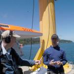 Chris Meinig, director of engineering at NOAAs Pacific Marine Environmental Laboratory, is interviewed during the launch of two Saildrones in Neah Bay. NOAA Fisheries, Saildrone Inc. and Fisheries and Oceans Canada have teamed up to launch five Saildrones this summer to test their accuracy and efficiency in assessing West Coast fish stocks. (Rob Ollikainen/Peninsula Daily News)