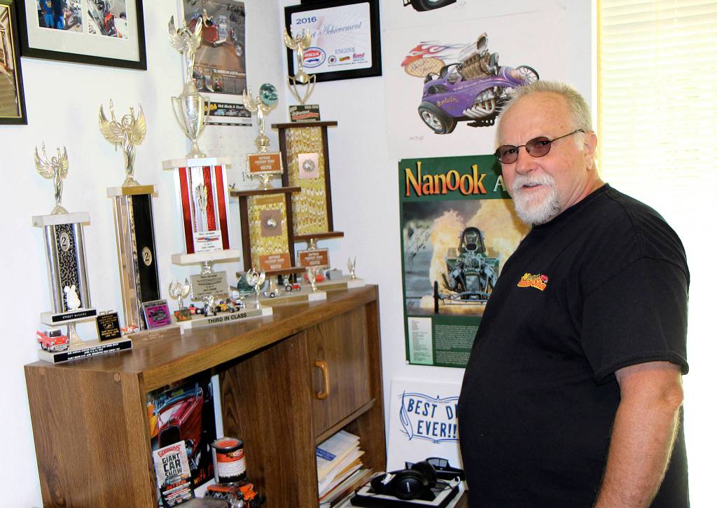 DAN HAMMOCK | THE DAILY WORLD                                Bruce Jones with just some of the trophies hes earned showing his classic cars for more than 40 years.
