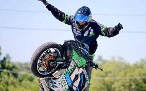 PHOTO COURTESY KYLE SLIGER                                Four motorcycle stunt teams will perform July 28 at the Bikers at the Beach rally in Ocean Shores, including Kyle Sliger, a stunt rider from Fort Wayne, Ind. Other performers include the Seattle Cossacks, the Tenino Motorcycle Drill Team and the all-Harley stunt team One Wheel Revolution.