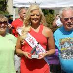 DAN HAMMOCK | THE DAILY WORLD                                Ray and Ann Kimbel of Shelton took home the participants choice award for their 1963 Mercury Comet at the Historic Montesano Car Show Saturday. Presenting all awards was Miss Grays Harbor Kuinn Karaffa.