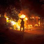 At least 2 dead, scores of homes lost as fire sweeps into Redding, Calif.