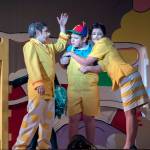 (Katherine Fowler) Mr. Mayor (Michael Turpin) talks to JoJo (Sam Dorsch) as Mrs. Mayor (Kathryn Thomas) hugs him.