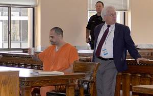 DAN HAMMOCK | THE DAILY WORLD                                Isaac J. Gusman sits beside his attorney, David Arcuri, on Thursday before Superior Court judge Ray Kahler delivered not guilty verdicts on four charges of kidnapping and attempted kidnapping. Kahler found Gusman guilty only of unlawful imprisonment related to a May attack on a woman in Montesano.