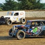 Anthony Pope, top, and Kyle Frelich race in the dwarf car class on Friday at Grays Harbor Raceway. (Photo by AR Racing Videos)