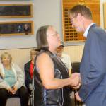Terri Bakse, left, shakes Rep. Derek Kilmers hand during a ceremony to honor Vietnam War veterans Wednesday, Aug. 22, 2018, in Elma. Baskes father-in-law served two tours in Vietnam. Her late husband also served. Photo by Michael Lang, The Vidette