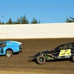 Steve Bulpitt (8) and Justin Austin race for position in the Modifieds class at Grays Harbor Raceway on Sunday. (Photo by AR Racing Videos)