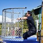 Ocean Shores Police Chief Neccie Logan took the plunge (again and again) at the dunking booth at the Paddle the Shores event held Saturday at Oyhut Bay Seaside Village and produced by the non-profit Ocean Shores Fresh Waterways Corp. Scott D. Johnston photo