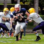 PWV running back Peter Hamilton runs for a first down against the Concrete Lions on Saturday at Willapa Valley High School. PWV won the game 42-0. (Ryan Sparks | The Daily World)