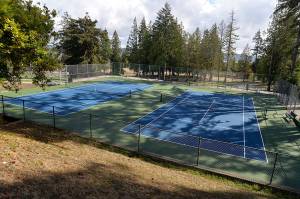 Louis Krauss | The Daily World                                The Sam Benn Park tennis courts are now open after a recent resurfacing project. The project was paid for by some local donors.