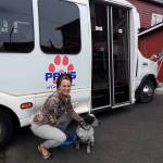 Kat Bryant | The Daily World                                Molle Bouch, board president of PAWS of Grays Harbor, hopes to raise enough money to replace the groups 12-year-old Ford E-450. With her is Xena, a 2-year-old blue heeler/pit bull mix whos looking for a home.