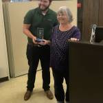 Louis Krauss | The Daily World                                Aberdeen Mayor Erik Larson presents an award to Alice Phelps as appreciation for her more than 19 years of service as a council member for the city.