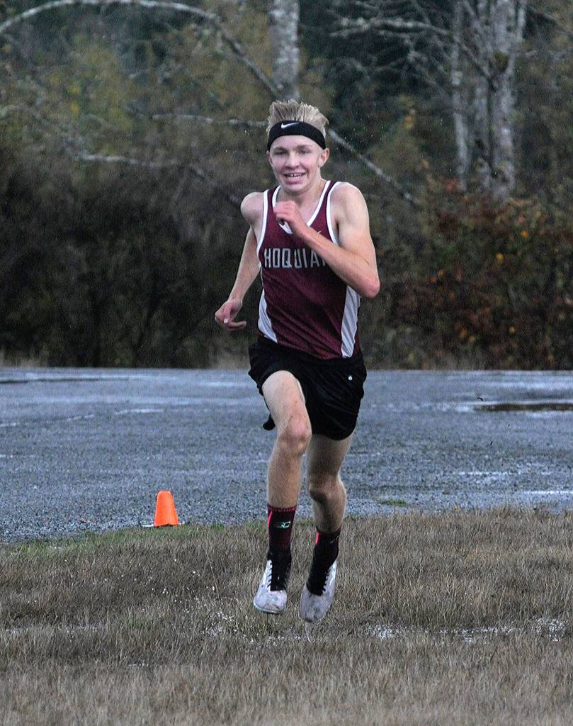 Hoquiams Adam Petersen crosses the finish line to take first at the Elma cross country meet on Thursday.(Hasani Grayson | The Daily World)