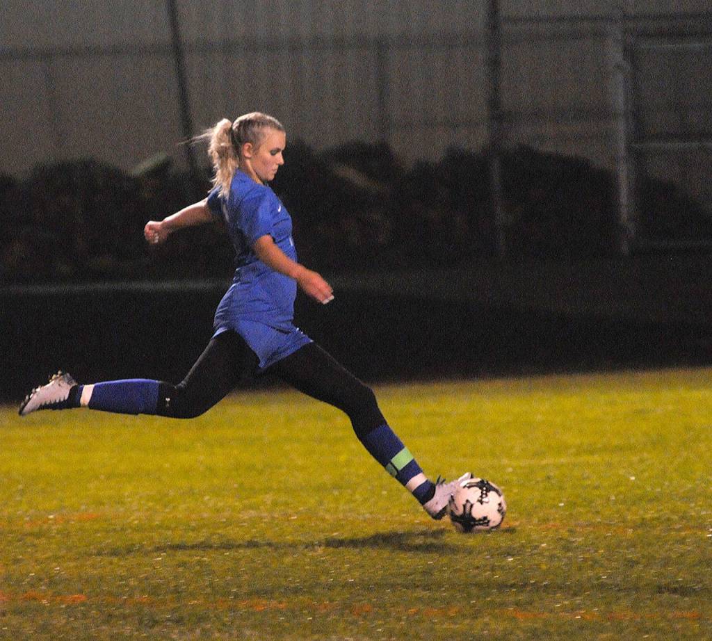 Elmas Brooke Sutherby takes a shot from outside the 18 yard box in a game against Charles Wright on Thursday at Davis Field in Elma. (Hasani Grayson | The Daily World)