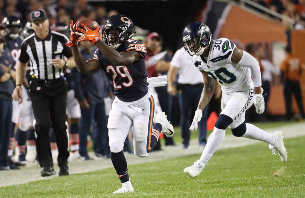 Chicago Bears running back Tarik Cohen (29) makes a reception ahead of the defense of Seattle Seahawks defensive back Bradley McDougald (30) in the second quarter on Monday, Sept. 17, 2018 at Soldier Field in Chicago, Ill. (John J. Kim/Chicago Tribune/TNS)