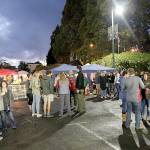 Photos by Travis Rains | The Vidette file                                Music is easily heard from outside of Whitneys detail shop where the 2017 Catch Montesano Fish and Brew Fest attendees ate, played cornhole and took a break from the crowded shop.