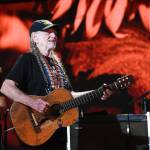 Willie Nelson entertains the crowd at Farm Aid 2017 In Burgettstoen, Pa.. Nelson will play at a rally for Texas senatorial candidate Beto ORourke on Sept. 29. (Jeff Moore/Zuma Press/TNS)