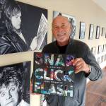 (Photo courtesy Wil Russoul) Rock photographer Darrell Westmoreland shows his new book full of portraits he has snapped through the years, including many of the ones on display at the DR Event Center in Aberdeen. Pictured at left are Meat Loaf (top) and Ozzy Osbourne.