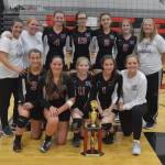 The Ocosta Wildcats volleyball team poses with its first-place trophy after winning the Raymond Tournament on Saturday at Raymond High School. (Photo by Jim Snider)