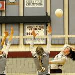 Hoquiams Elyse Goulet, right, comes up with the kill against Montesano on Tuesday. (Hasani Grayson | The Daily World)