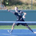 Aberdens Cody Sayers reaches out for a shot in a doubles mach against Centralia at Sam Benn Park on Wednesday. (Hasani Grayson | The Daily World)