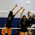 Grays Harbors Leleo Maeva, right, records a kill agains Centralia on Wednesday. (Hasani Grayson | The Daily World)