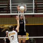 Ocostas Kelly Poirer, right, blocks a shot from South Bends Karley Reidinger during a game at South Bend. (Hasani Grayson | The Daily World)