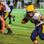 Aberdeen running back Aidan Neeley, right, carries the football during the Bobcats 21-14 win over Centralia on Friday at Centralia High School. (Photo by Jared Wenzelburger | The Chronicle)