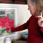 Swanson explains how she used a single green pigment to paint both the light and dark sides of the leaves in this piece, which hangs in her dining room.