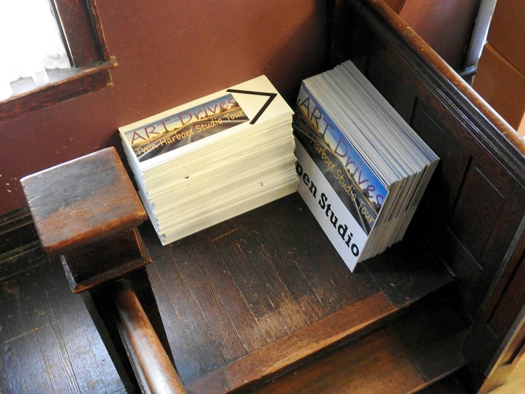 Signs to be placed for this weekends Art Drives are stacked on the landing at Swansons house.