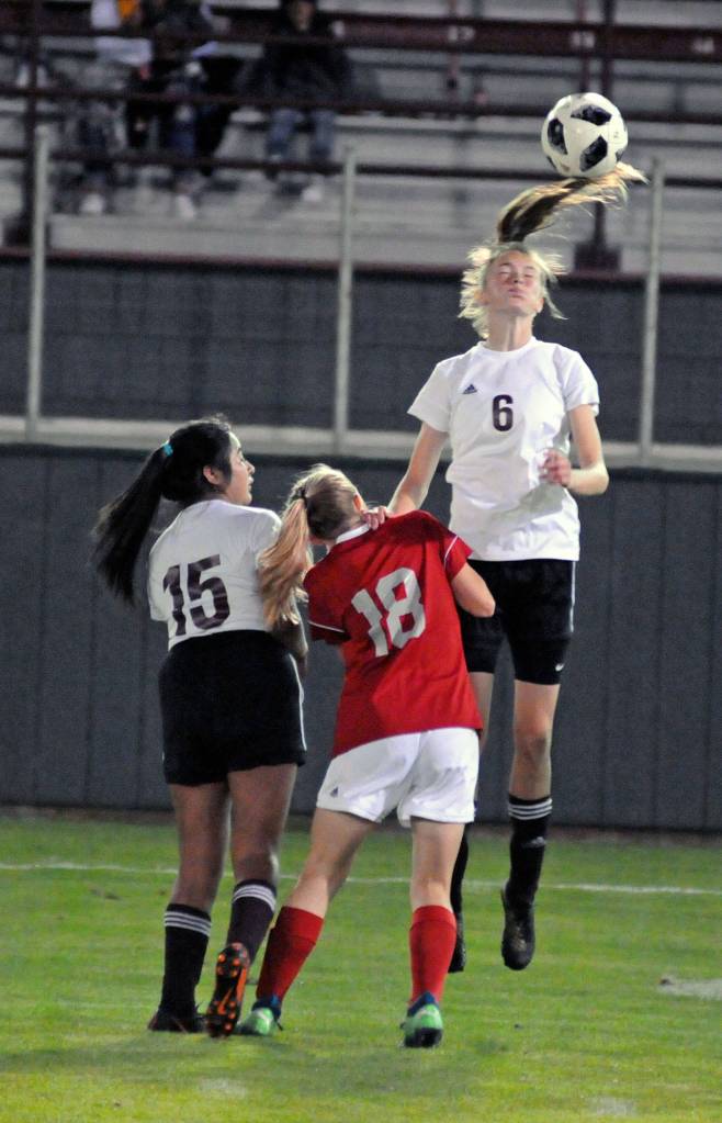Raymond-South Bends Kyra Gardner heads the ball during the Riptides game against Hoquiam on Tuesday in Hoquiam. (Ryan Sparks | The Daily World)