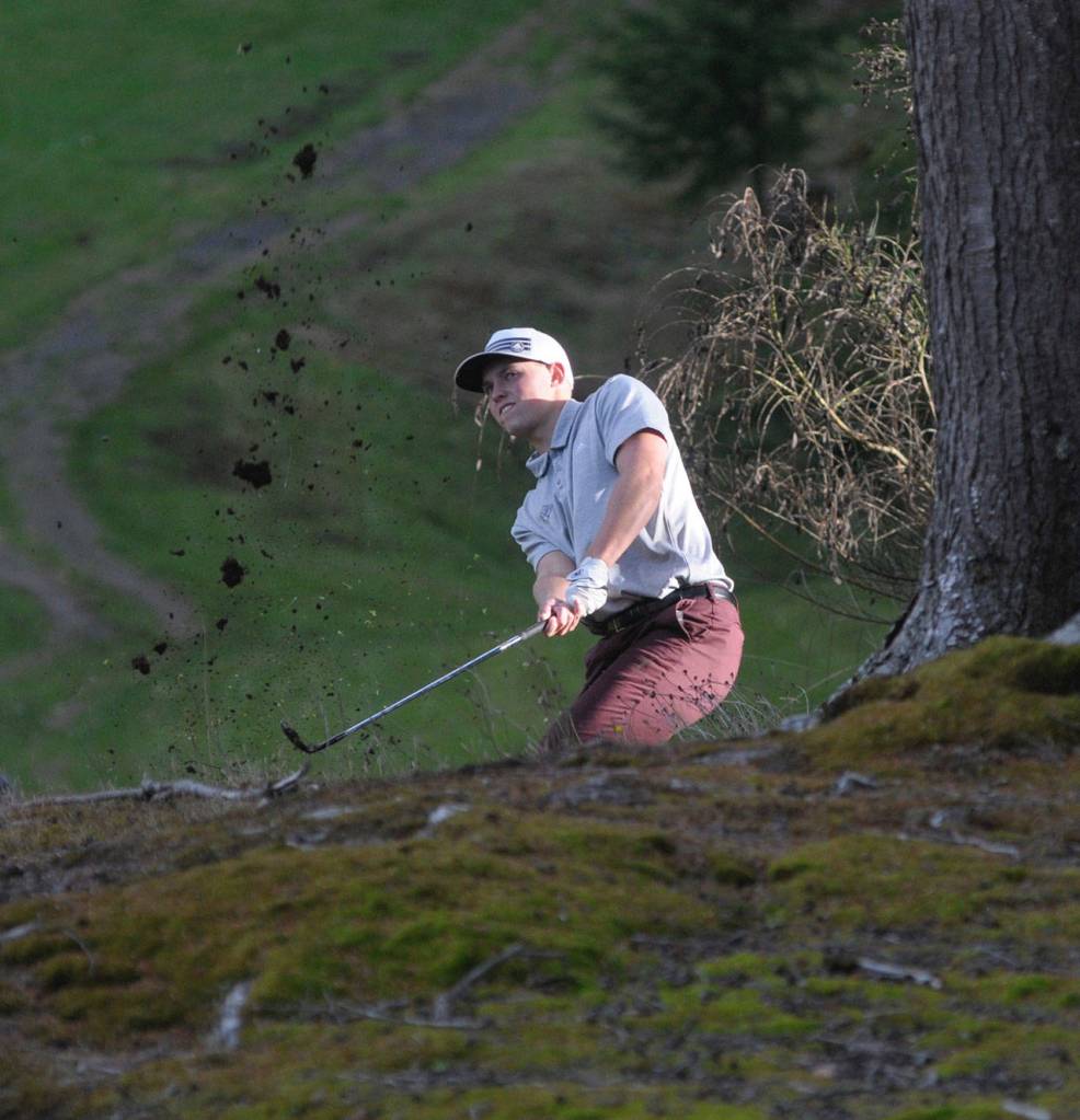 Montesanos Payson Parker takes a shot from the edge of the fairway on the 17th hole at Highladns Golf Course on Tuesday.