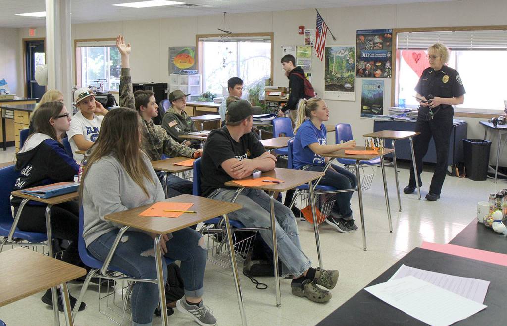 Students in Laura Nelsons forensics science class ask questions about a hypothetical case of Shultz (right) while she visits the classroom during her stop at the school last week in Elma.
