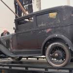 DAN HAMMOCK | GRAYS HARBOR NEWS GROUP                                Ed Lind (in white hard hat) watches as his 1929 Chevrolet is towed from the armory building, where it had been on display at the Aberdeen Museum of History until fire gutted the building June 9. The car was original right down to the fan belt and had been part of the Linds life since the late 60s.