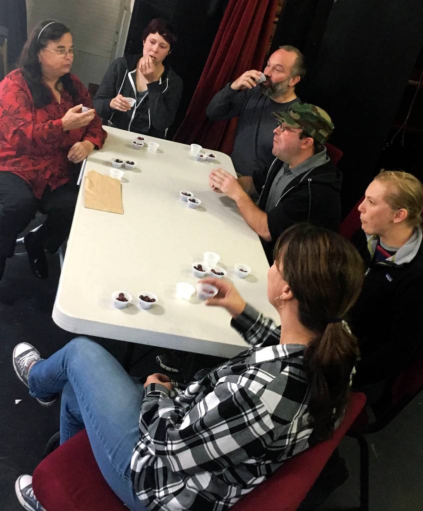 (Kat Bryant | Grays Harbor News Group) Six adults entered the cranberry eating contest: clockwise from top left, Jackie Diles, Hana Tweed, Richard Johnston, Jesse Diles, Kat Reynolds and Michelle Corey. Johnston and Corey tied in the first round and again in the second, so they were both declared winners.