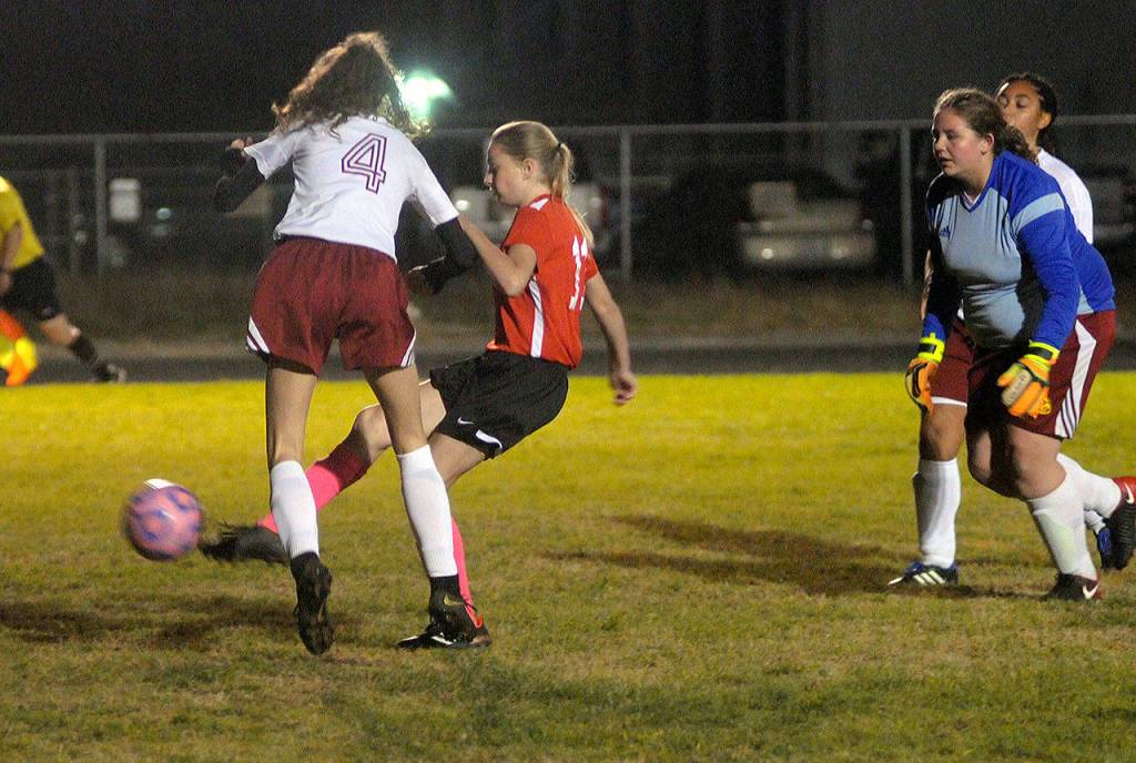 Ocostas Nevaeh Smith scores a goal in the 79th minute against Winlock in the Wildcats 4-0 win on Monday. (Hasani Grayson | Grays Harbor News Group)