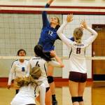 Elmas Jalyn Sackrider rises for a kill during the Eagles 3-1 victory over Hoquiam on Tuesday at Hoquiam High School. (Ryan Sparks | Grays Harbor News Group)