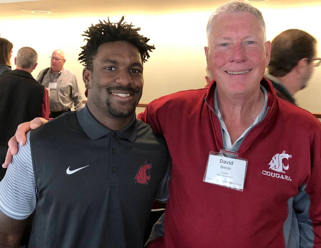 Cougars running back James Williams poses with WSU alumnus David Bielski on Thursday before the WSU-Oregon game.