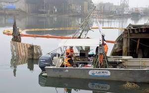 DAN HAMMOCK | GRAYS HARBOR NEWS GROUP                                Crews from Global Diving and Salvage Inc. contained the diesel fuel leaking from one or both of two vessels that sank in Hoquiam River Wednesday afternoon. As of Friday morning, the Department of Ecology Spill Response Team reported the boats were stacked one on top of the other, making removal of the fuel and the vessels themselves tricky.